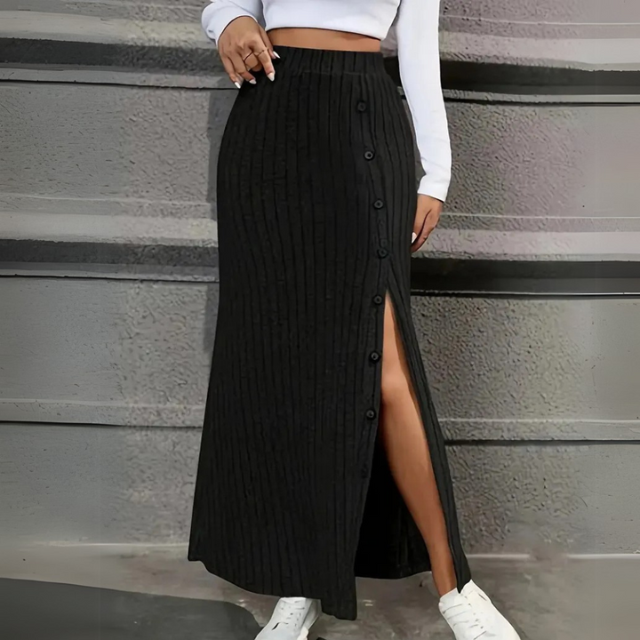Stylish women's ribbed knit maxi skirt in a dark navy, a versatile addition to any wardrobe