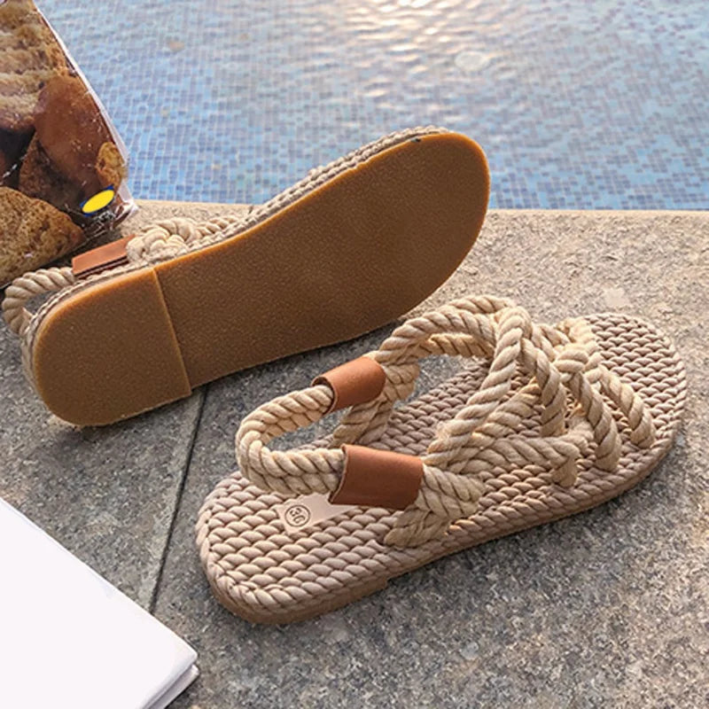 Stylish black women's braided gladiator sandals, chic summer footwear for casual outings, beach & vacation comfort.