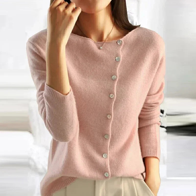 Women's chic button sweater. Elegant knitwear, perfect for a versatile fashion statement.
