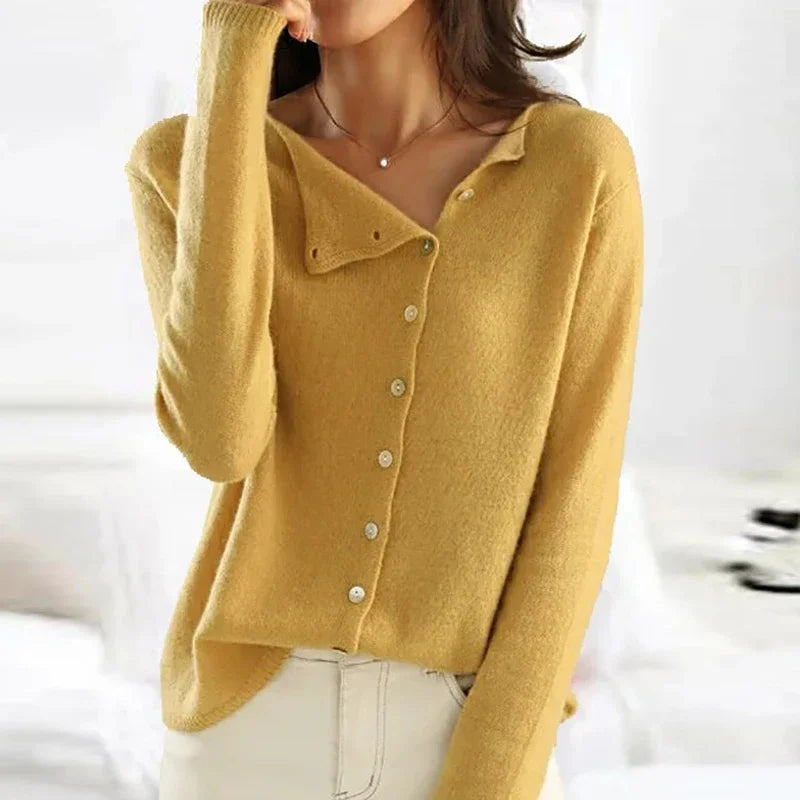 Trendy button-up sweater for women. Chic knit top with stylish button closure, versatile fashion.