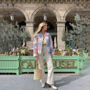 Close-up of a women's floral spring jacket. Lightweight fabric, chic design, perfect for warmer days.