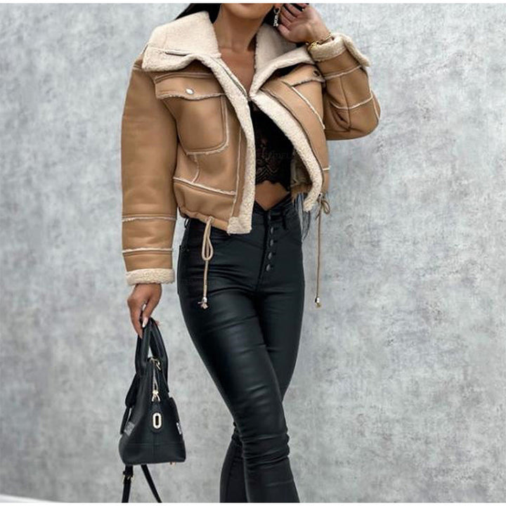 Woman in a chic lapel motorcycle jacket. Stylish & comfortable casual outerwear with sherpa lining for fall/winter.