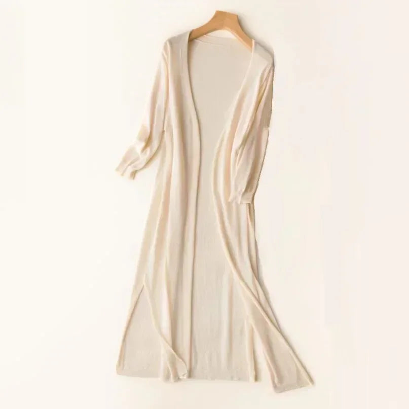 Versatile long-sleeve women's cardigan in a neutral tone, ideal for autumn fashion.