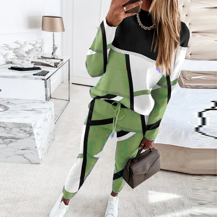 Relaxed women's O-neck top & long pants set, perfect as comfortable loungewear or casual wear.