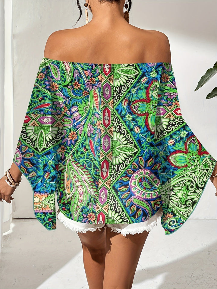 Comfortable patterned off-shoulder blouse for women, featuring a vibrant geometric print & relaxed fit.