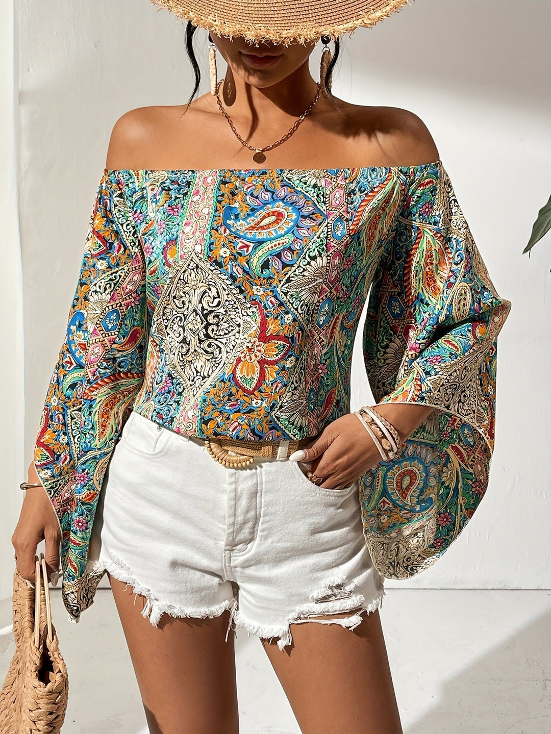 Vibrant patterned off-shoulder top for women, showcasing a unique geometric design.