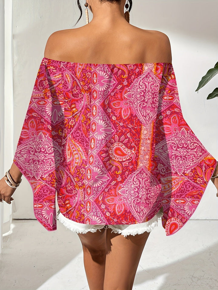Chic off-shoulder blouse for women with vibrant geometric print and stylish flared sleeves.