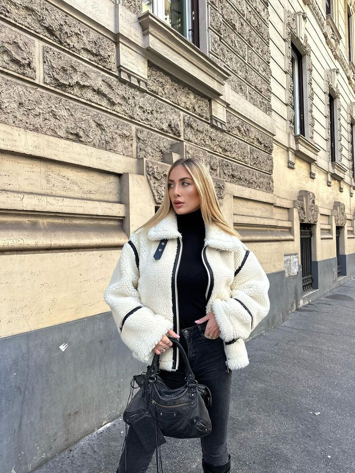 Warm & trendy women's oversized teddy aviator jacket in cream, a chic and cozy statement for winter.
