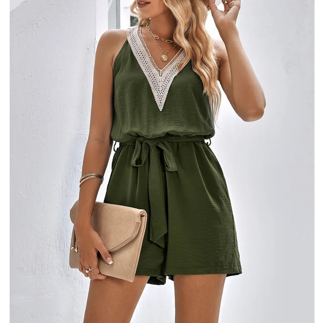 Chic patterned V-neck women's shorts jumpsuit. Trendy summer one-piece outfit, ideal for casual warm weather fashion.