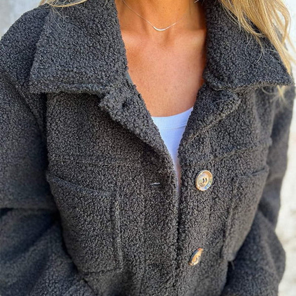 Plus size women's short teddy coat with a chic lapel collar. Cozy & stylish fall/winter casual outerwear.