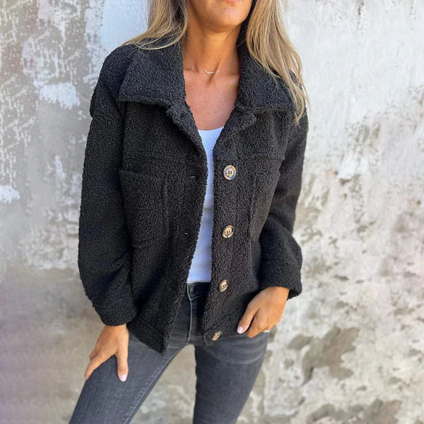 Trendy women's short teddy jacket with lapel. Versatile, cozy outerwear for fall & winter fashion.