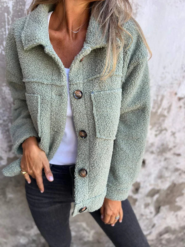 Women's short teddy coat with lapel collar. Warm, cozy fall/winter jacket for chic casual style.