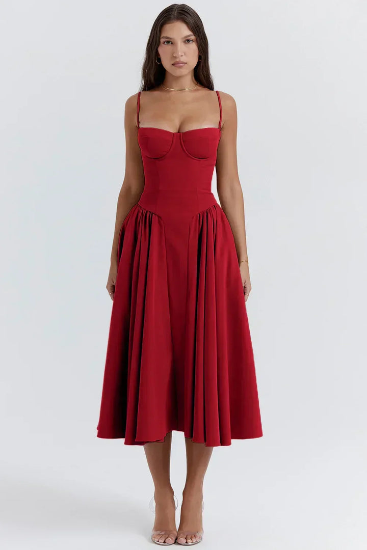 Stylish Mira summer dress with a cinched corset waist & delicate adjustable spaghetti straps.