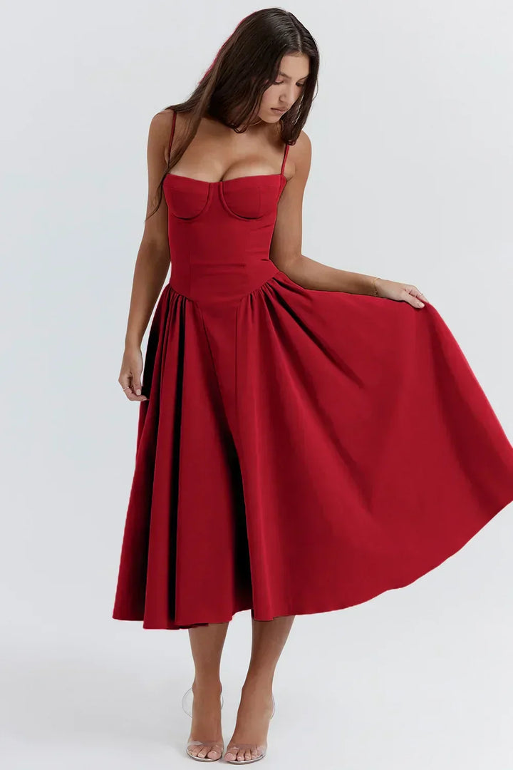 Stylish women's midi summer dress, spaghetti straps, flattering corset waist, chic design.