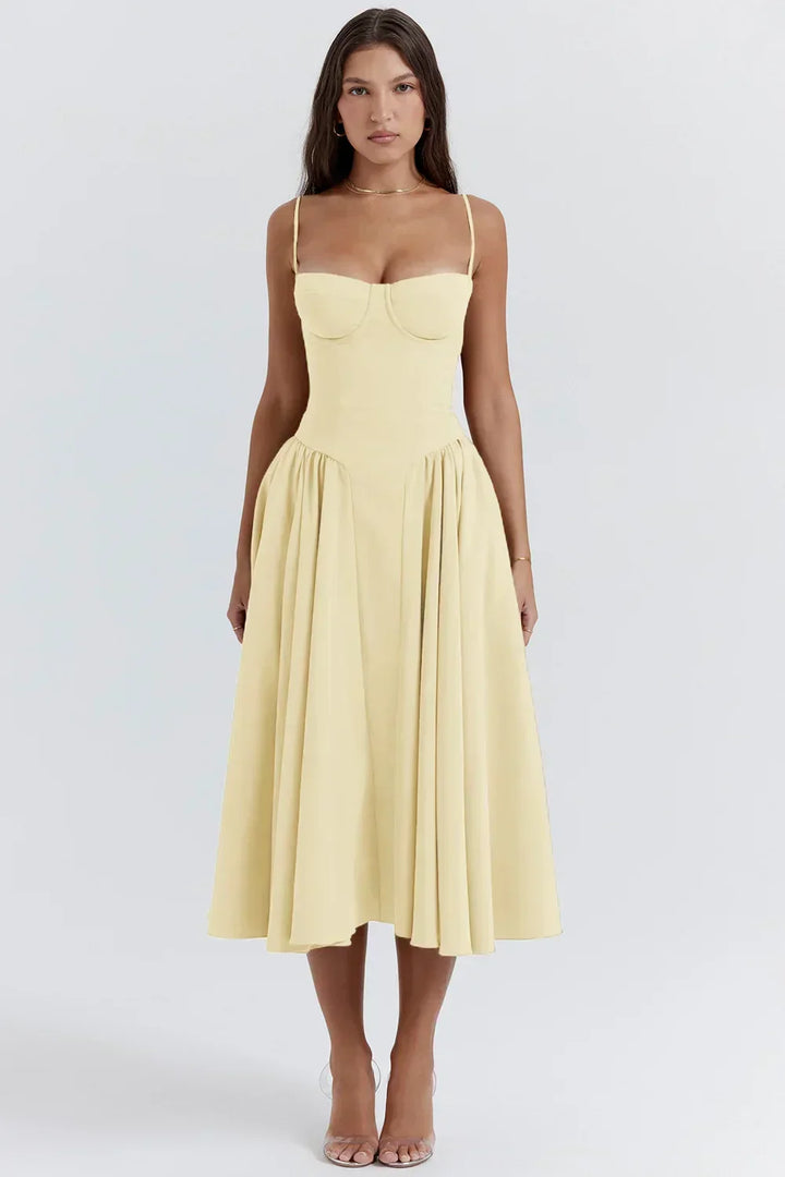 Stylish women's summer dress with a flattering corset waist & a beautiful flared midi skirt.