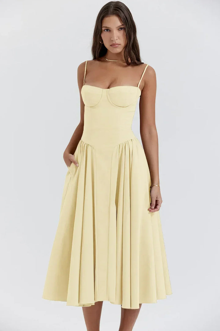 Elegant women's midi dress, perfect for summer, with a corset waist & spaghetti straps.