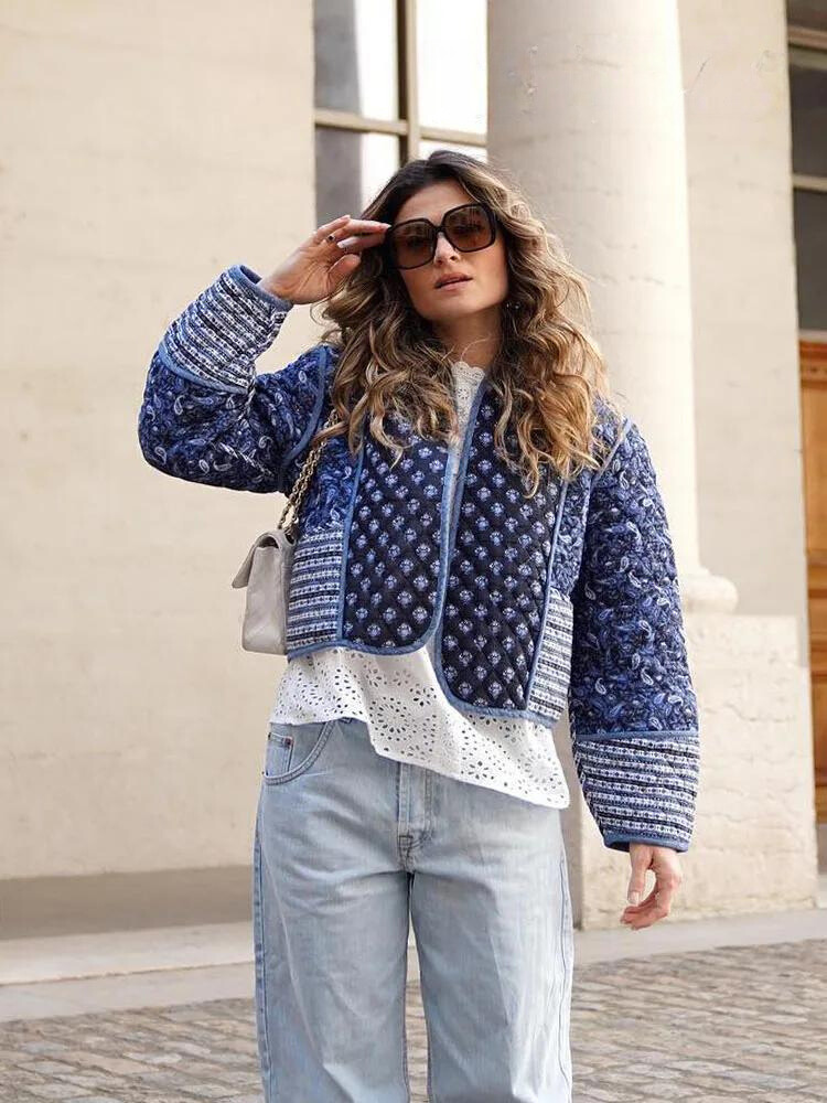 Unique vintage floral patchwork jacket for women. Fashionable and chic outerwear, perfect as a stylish blazer.