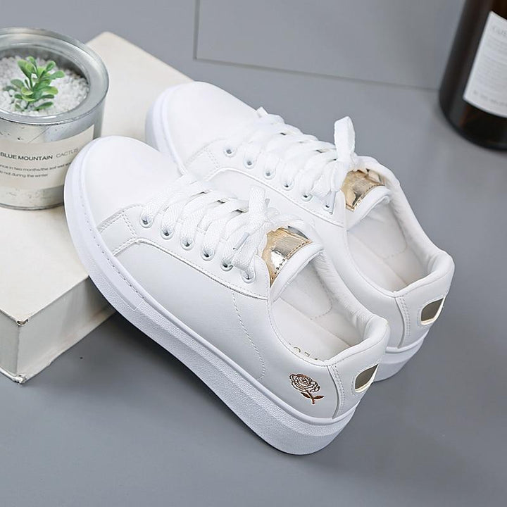 Fashionable ladies' metallic accent sneakers, offering everyday comfort & versatile sporty chic style.
