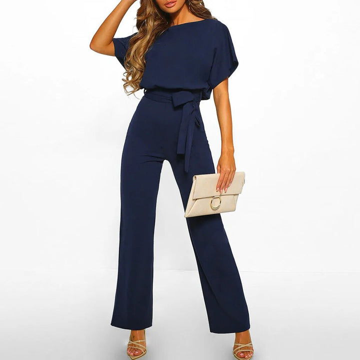 Fashionable women's wide-leg jumpsuit with a flattering waist, offering a chic and comfortable silhouette.