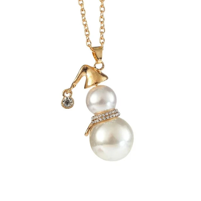 Women's Christmas snowman pearl necklace. Festive holiday jewelry, elegant accessory & winter fashion gift.