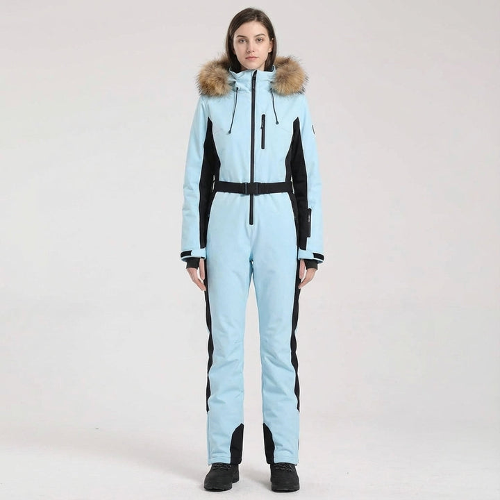 Stay warm in Clarissa women's hooded ski suit, waterproof and insulated for extreme conditions.
