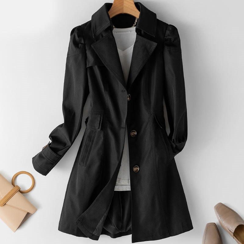 Ladies' classic mid-length trench coat. Elegant outerwear for women, ideal for spring and fall fashion.