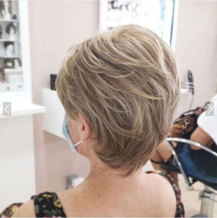 Versatile women's clip-in hair extensions, ideal for adding natural volume to short hair.