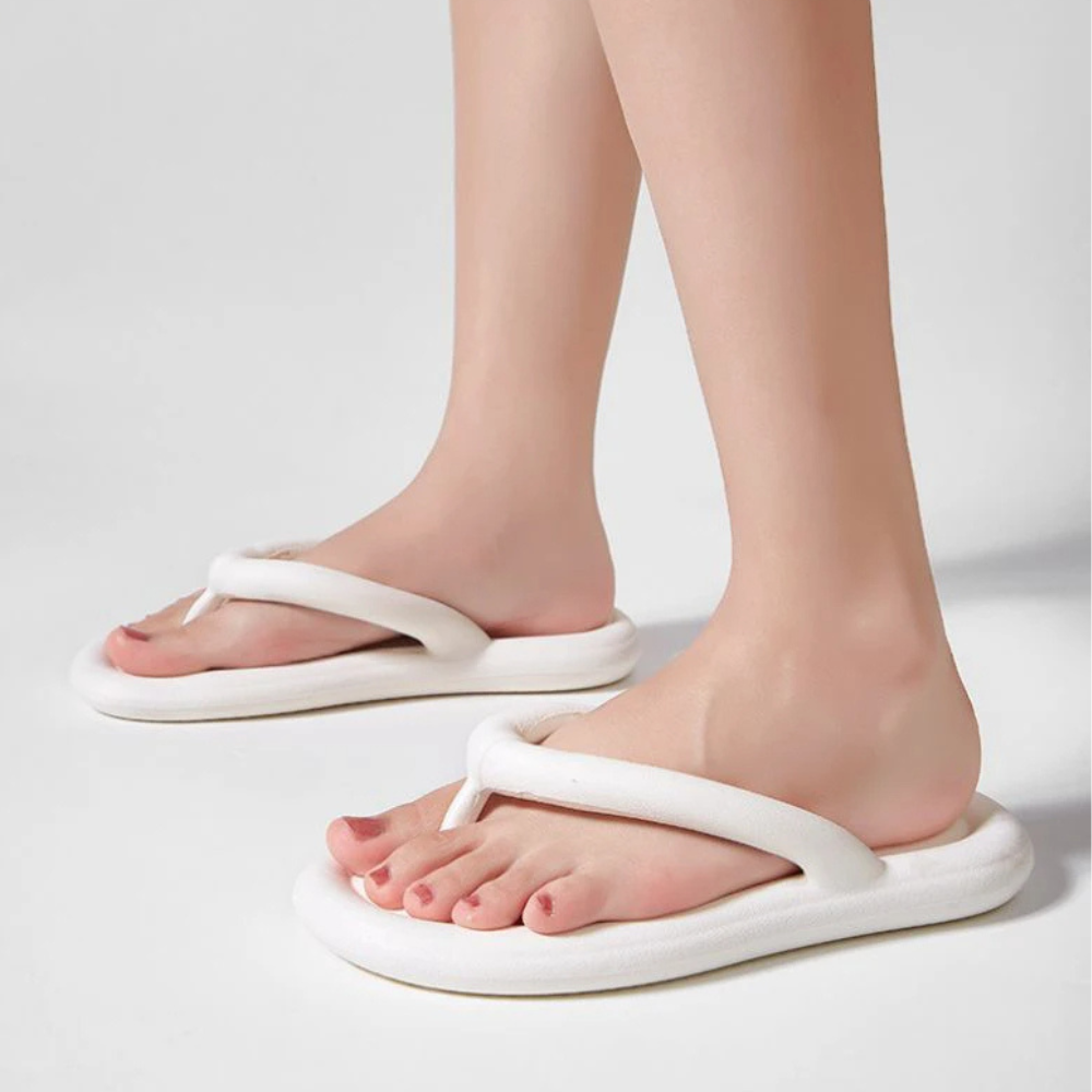 Women's cloud-soft comfort flip-flops, versatile summer footwear, great for beach & casual slides.