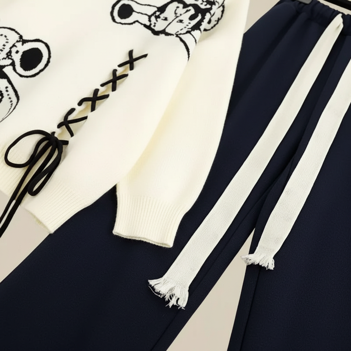 Stylish women's two-piece lounge wear set, a warm sweater and pant combo for ultimate comfort.