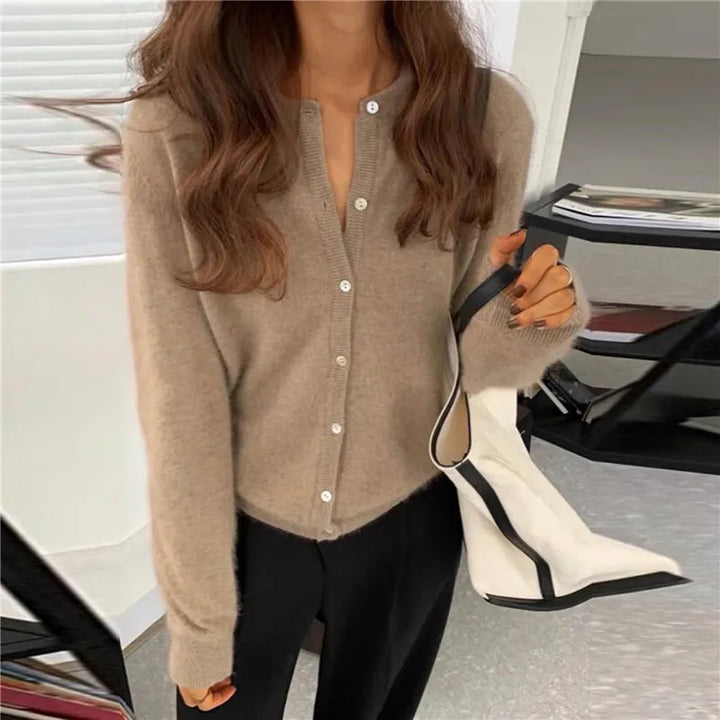 Comfortable long-sleeve knitted button-front cardigan for women, perfect for everyday wear.