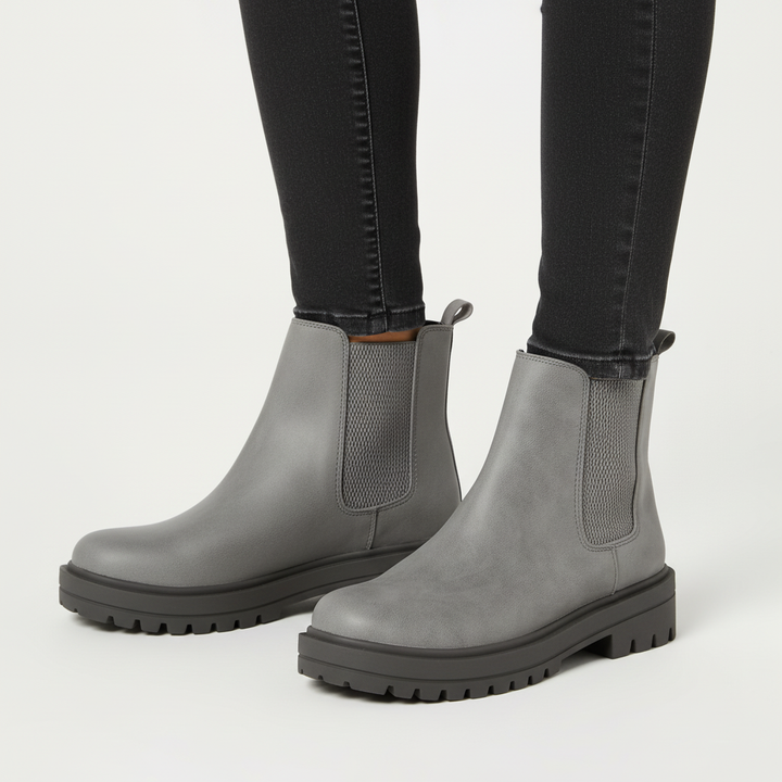 Stylish women's Chelsea ankle boots, pair from above, essential autumn and winter footwear