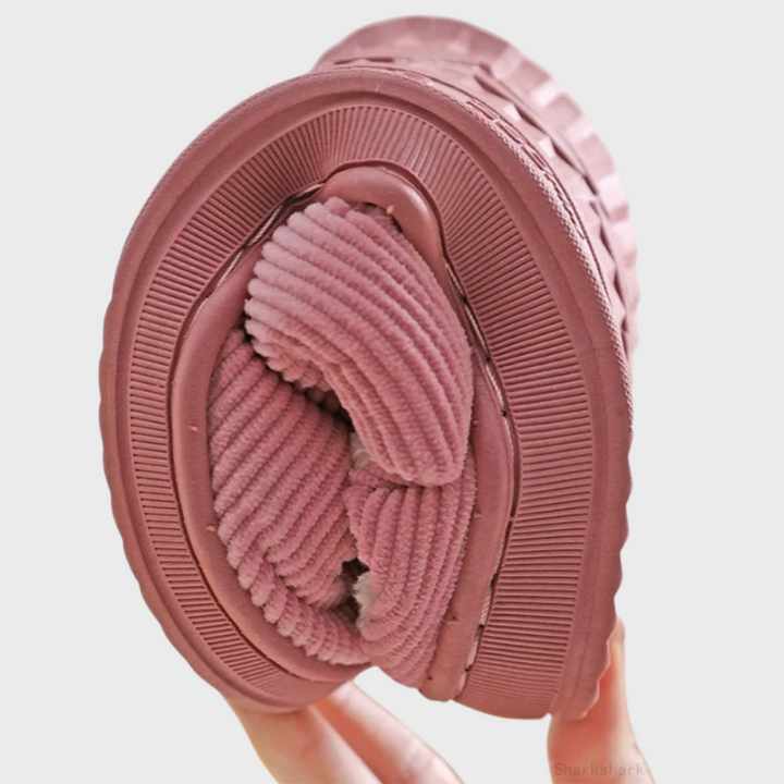 Plush, comfortable women's cloud slide slippers for ultimate everyday indoor comfort.
