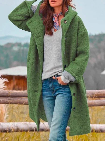 Ladies' relaxed fit casual coat, long sleeve, featuring button closure & practical pockets. Versatile modern outerwear.