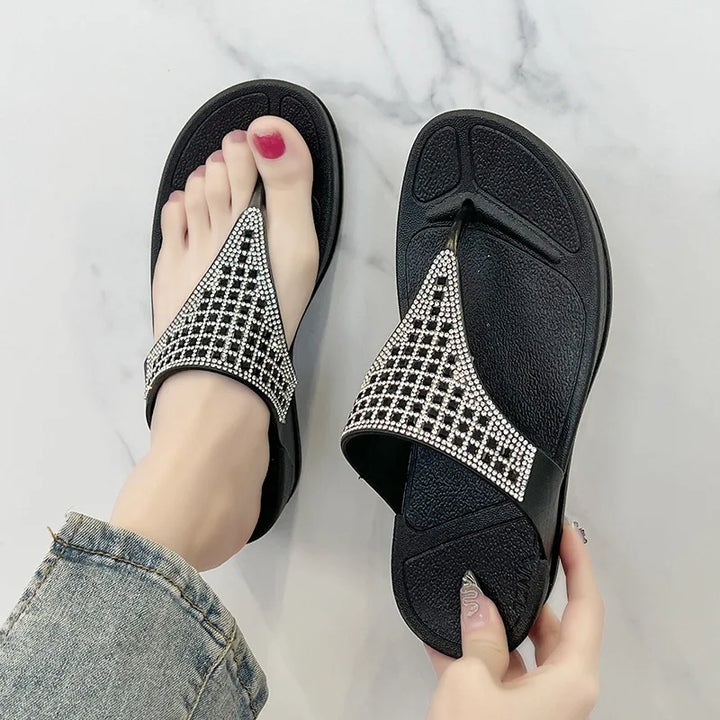 Close-up of Geneva women's platform slipper showcasing intricate rhinestone embellishments