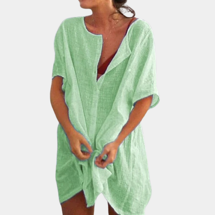 Women's casual shirt dress styled with a belt, enhancing its elegant and comfortable silhouette for daily wear.