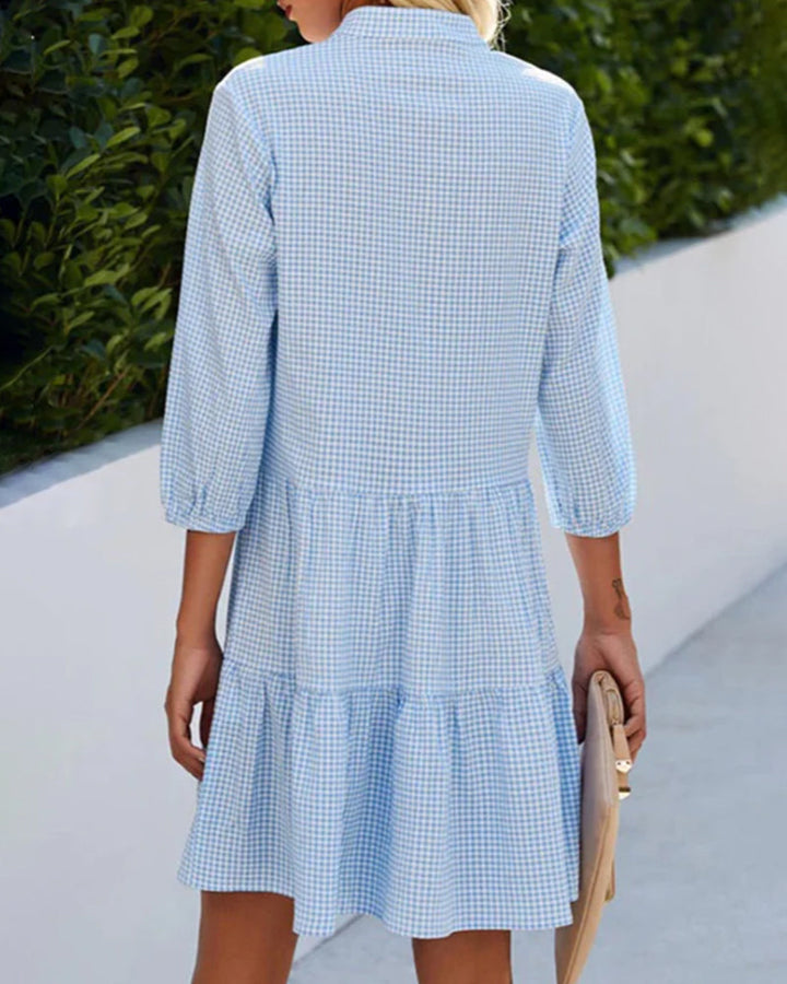Feminine knee-length summer dress with V-neck, comfortable & easy-care cotton.
