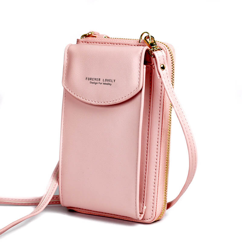 Woman wearing a compact black PU leather shoulder bag, demonstrating its comfortable fit & size
