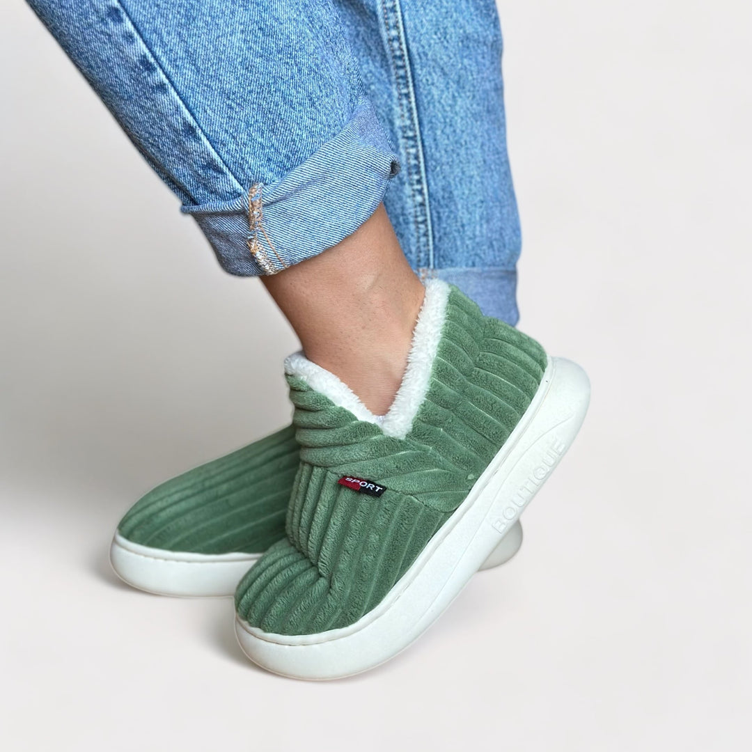 Plush Aurora women's house slippers, offering warm & cozy comfort. Ideal loungewear footwear.