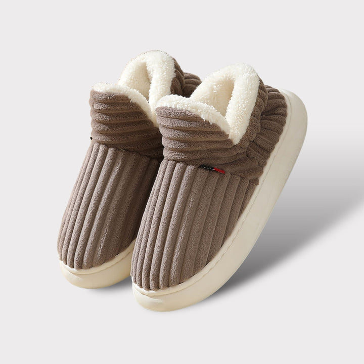 Soft Aurora women's plush slippers, providing cozy comfort & warmth for relaxing at home.