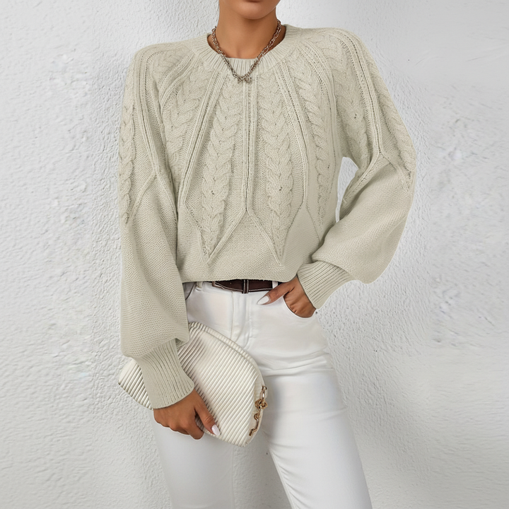 Full length shot of women's cozy cable knit lantern sleeve sweater, versatile for autumn wear