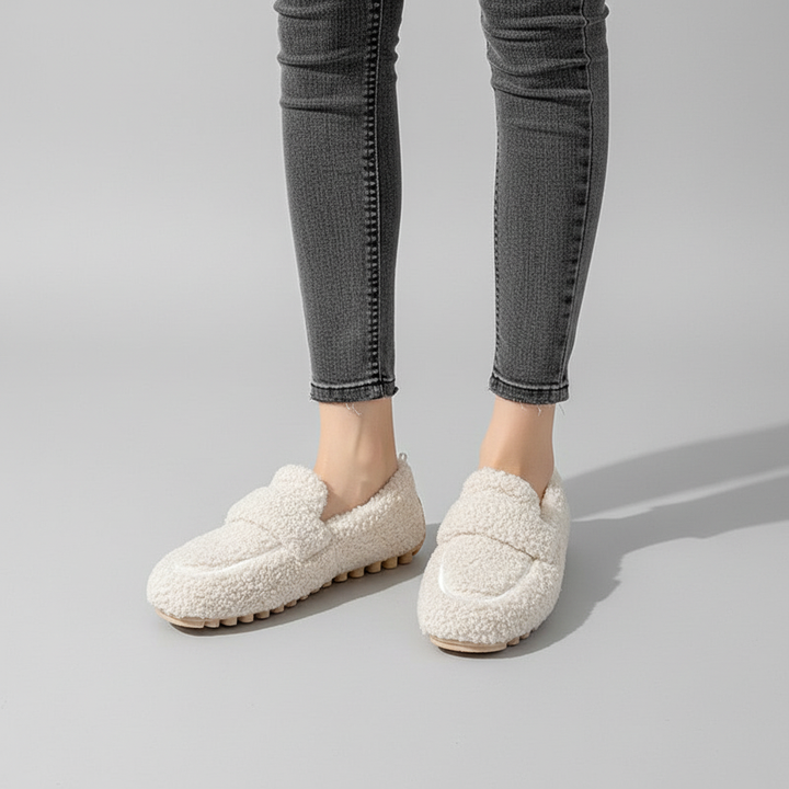 Plush women's winter house shoes, fleece-lined for warmth and comfort, stylish and practical