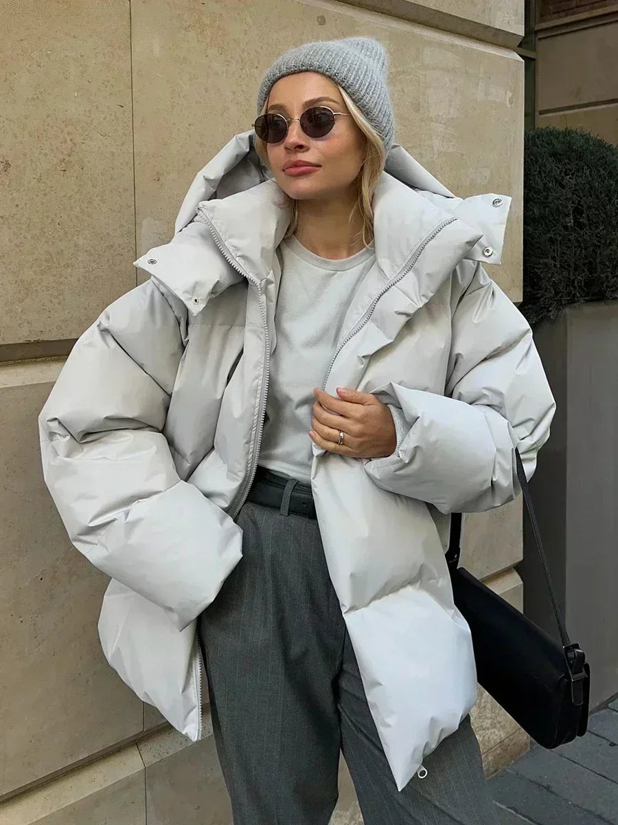 Durable women's quilted winter outerwear coat. Designed for extreme cold weather, a warm and cozy long sleeve jacket.