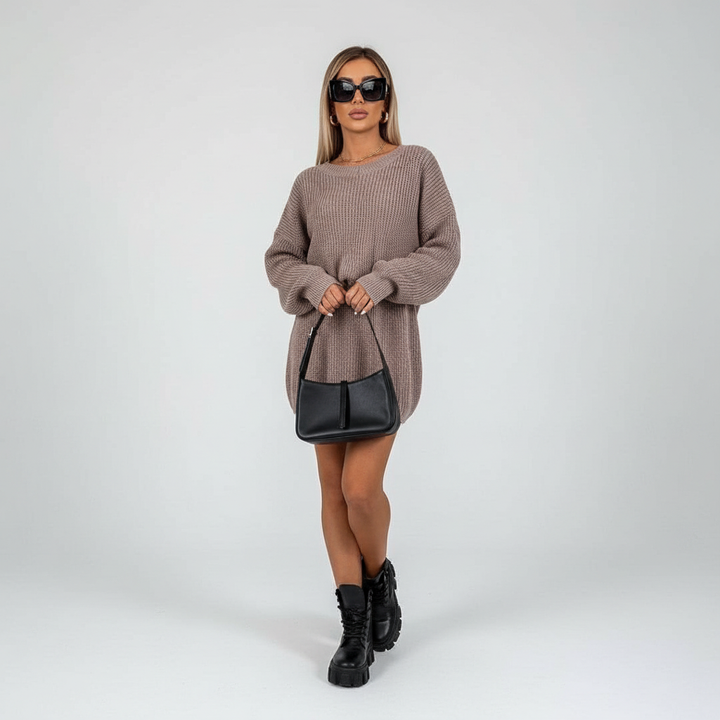 Autumn fashion essential: women's striped tunic sweater with a fashionable stand collar.