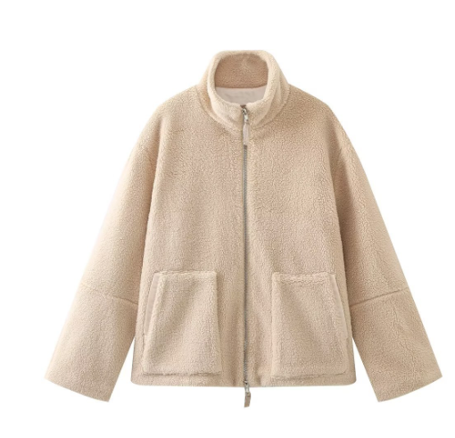 Effortlessly stylish women's teddy coat, providing plush warmth & comfort for any winter outfit.
