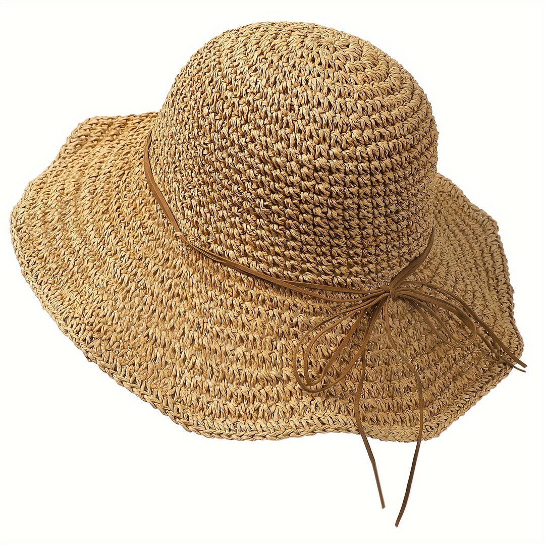 Versatile women's boho crochet straw hat, perfect for summer, travel, beach & sun.