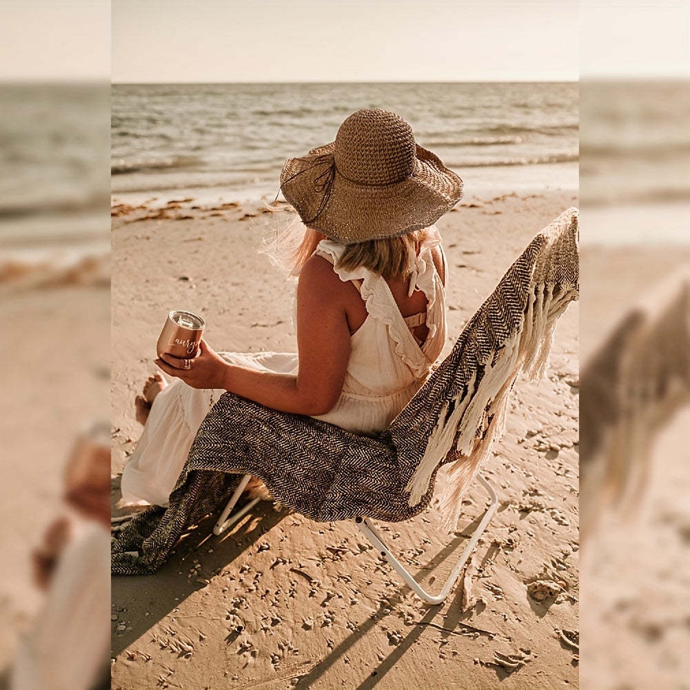 Woman enjoying the sun with a stylish crochet boho straw hat, ideal for summer travel.