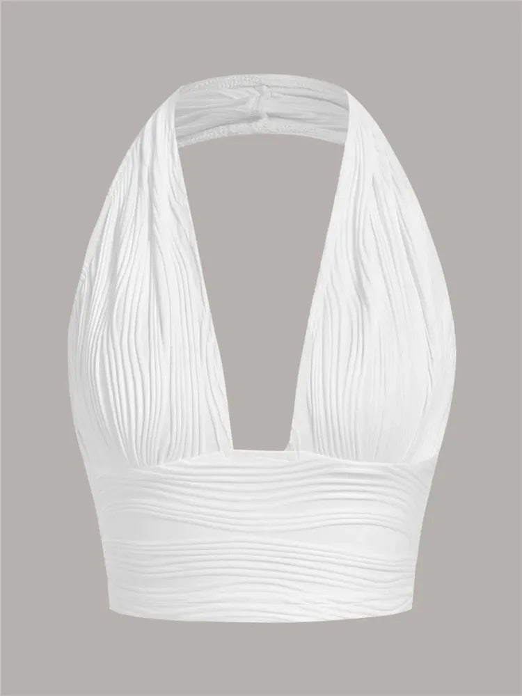 Trendy women's deep V-neck halter crop top with open back. Sleeveless and slim fit, perfect for summer clubwear.