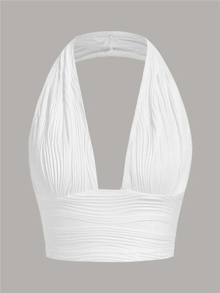 Trendy women's deep V-neck halter crop top with open back. Sleeveless and slim fit, perfect for summer clubwear.