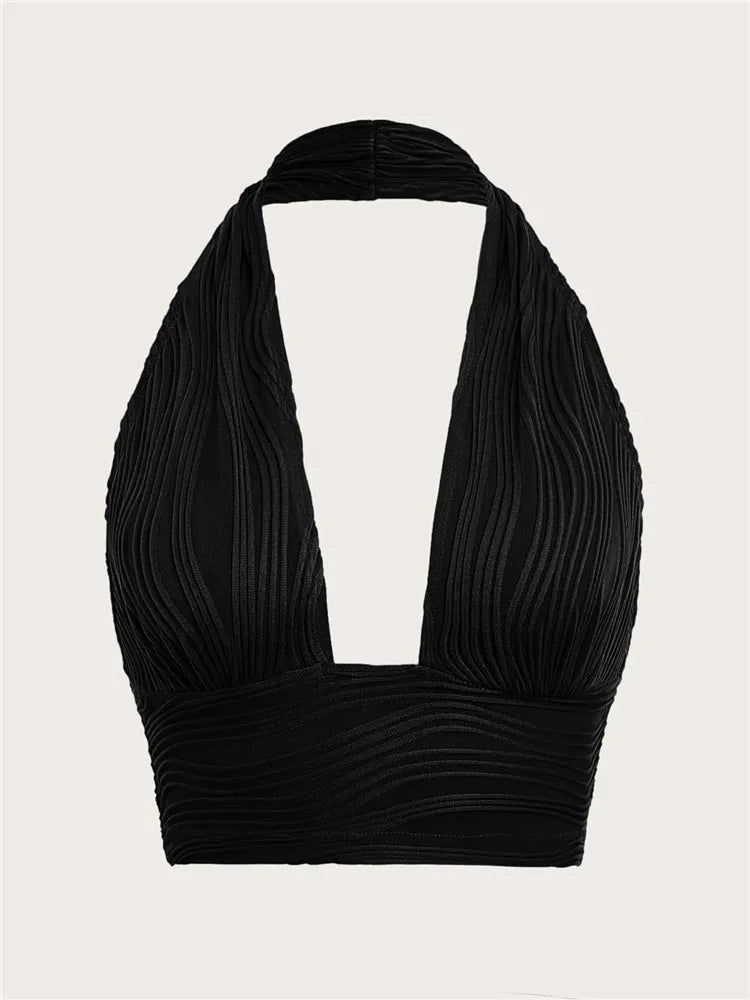 Chic women's deep V-neck halter top, open back. Slim fit sleeveless crop top, perfect for parties & summer clubwear.