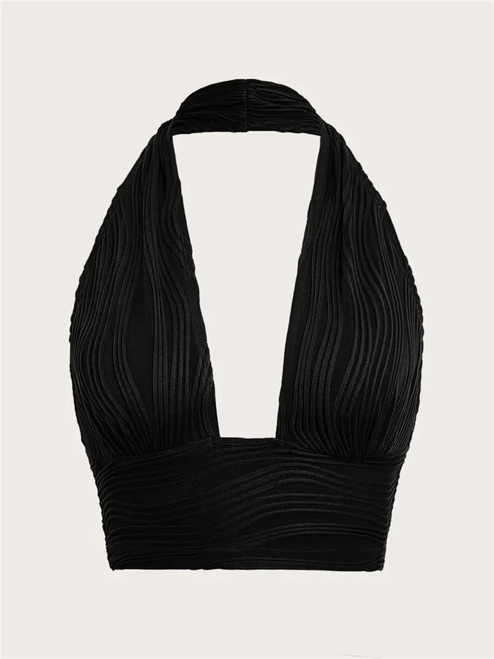 Chic women's deep V-neck halter top, open back. Slim fit sleeveless crop top, perfect for parties & summer clubwear.